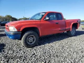 2000 Dodge Dakota Sport with VIN 1B7GG22N8YS574148, listed as a Copart auction lot 85686905 with 124,245 mi miles and Salvage title. Bid and sale history available at DreamBid. Image 1.
