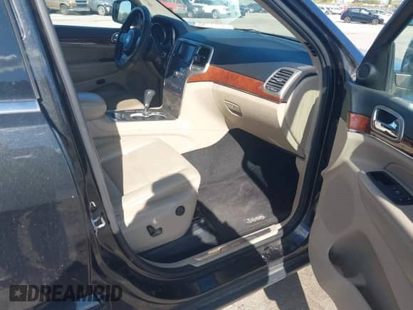 2013 Jeep Grand Cherokee Limited z VIN 1C4RJFBG4DC541915, wystawiony jako IAAI lot #43533562 z przebiegiem 164 436 mil mil oraz . Historia ofert i sprzedaży dostępna na DreamBid. Obrazek 5.