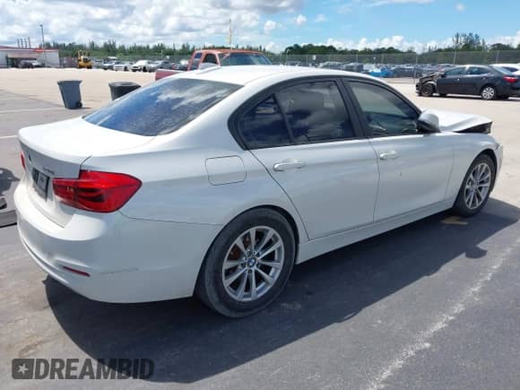 2017 BMW 3 Series 320i with VIN WBA8E1G51HNU15271, listed as a IAAI auction lot 43270593 with 141,415 mi miles and . Bid and sale history available at DreamBid. Image 4.