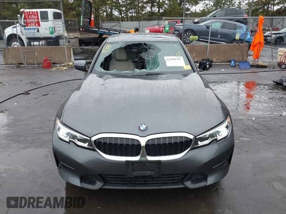 2020 BMW 3 Series 330i xDrive z VIN 3MW5R7J02L8B28220, wystawiony jako IAAI lot #43396767 z przebiegiem 60 487 mil mil oraz . Historia ofert i sprzedaży dostępna na DreamBid. Obrazek 6.