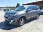 2018 Honda Pilot EX-L with VIN 5FNYF5H50JB006656, listed as a IAAI auction lot 43179982 with 130,515 mi miles and . Bid and sale history available at DreamBid. Image 2.