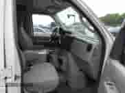 2014 Ford Econoline Cargo Commercial with VIN 1FTNE2EL6EDB13764, listed as a IAAI auction lot 42647684 with 99,876 mi miles and . Bid and sale history available at DreamBid. Image 5.