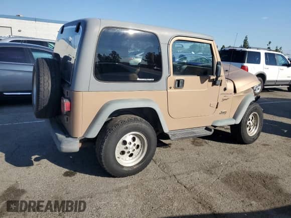 1999 Jeep Wrangler Sport with VIN 1J4FY19S9XP417531, listed as a Copart auction lot 86538315 with 161,004 mi miles and Salvage title. Bid and sale history available at DreamBid. Image 3.