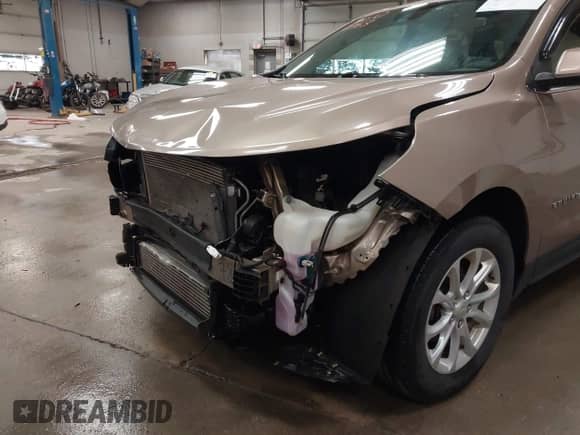 2018 Chevrolet Equinox LT с VIN 3GNAXSEV7JL105503, выставлен на аукционе IAAI как лот 43102763 с пробегом 171 421 миль миль и . История ставок и продаж доступна на DreamBid. Изображение 6.