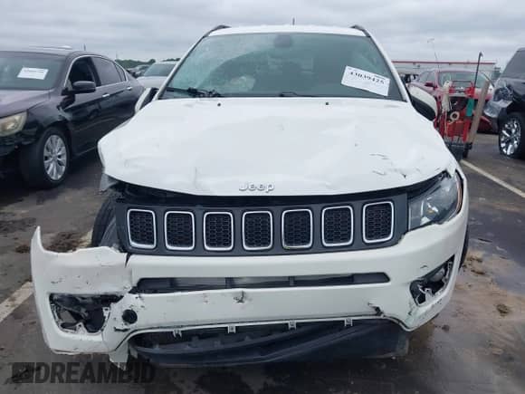 2021 Jeep Compass Altitude with VIN 3C4NJCBB6MT501857, listed as a IAAI auction lot 43039425 with 102,081 mi miles and . Bid and sale history available at DreamBid. Image 12.