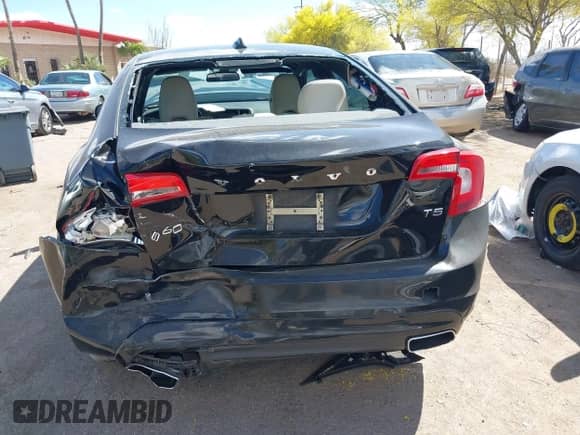 2015 Volvo S60 T5 Drive-E Premier with VIN YV140MFB3F2299721, listed as a IAAI auction lot 42013732 with 82,407 mi miles and . Bid and sale history available at DreamBid. Image 16.