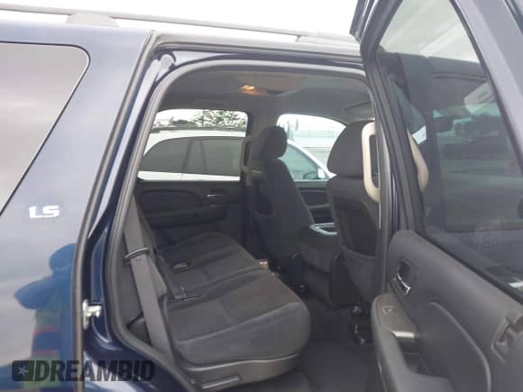 2007 Chevrolet Tahoe LS with VIN 1GNFC13C57R428771, listed as a IAAI auction lot 43332294 with 129,543 mi miles and . Bid and sale history available at DreamBid. Image 8.