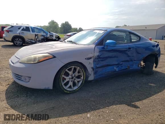 2007 Hyundai Tiburon GT с VIN KMHHN66F17U239526, выставлен на аукционе Copart как лот 64397625 с пробегом 136 807 миль миль и Списание • Salvage title. История ставок и продаж доступна на DreamBid. Изображение 1.