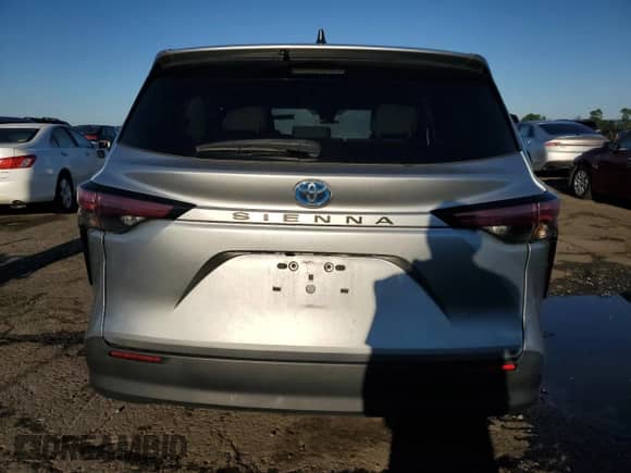 2022 Toyota Sienna LE с VIN 5TDKSKFCXNS062431, выставлен на аукционе Copart как лот 70089465 с пробегом 75 789 миль миль и Списание • Salvage title. История ставок и продаж доступна на DreamBid. Изображение 6.