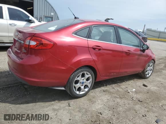 2012 Ford Fiesta SEL with VIN 3FADP4CJ0CM111809, listed as a Copart auction lot 53982225 with 110,401 mi miles and Salvage title. Bid and sale history available at DreamBid. Image 3.