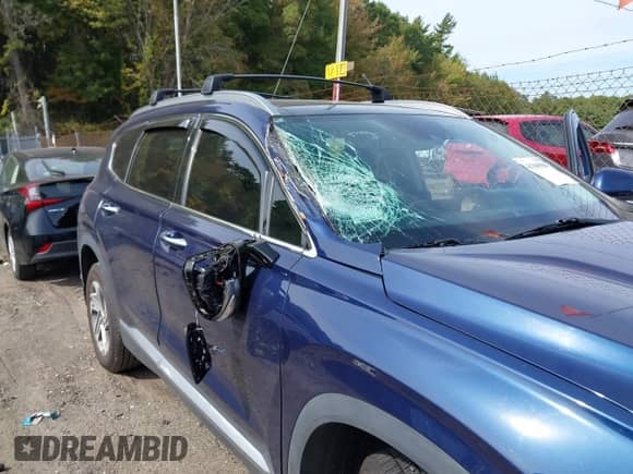 2021 Hyundai Santa Fe SEL z VIN 5NMS3DAJ0MH371194, wystawiony jako IAAI lot #43300588 z przebiegiem 60 801 mil mil oraz . Historia ofert i sprzedaży dostępna na DreamBid. Obrazek 6.