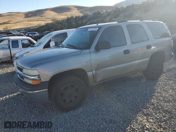 2002 Chevrolet Tahoe LT z VIN 1GNEK13T12J136864, wystawiony jako Copart lot #84018745 z przebiegiem 234 732 mil mil oraz Czysty tytuł • Clean title. Historia ofert i sprzedaży dostępna na DreamBid. Obrazek 1.