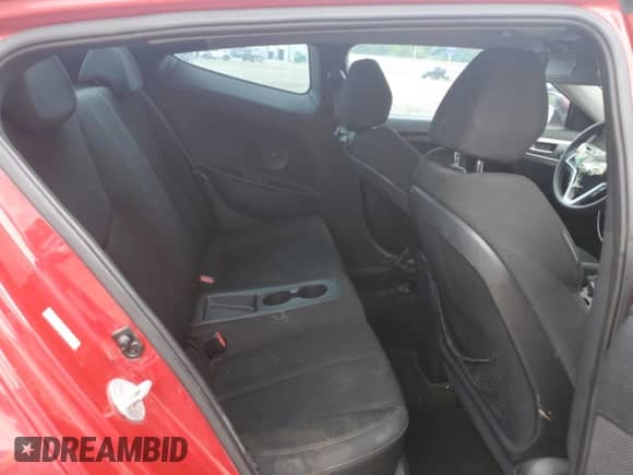 2013 Hyundai Veloster w/Black Int z VIN KMHTC6AD5DU173242, wystawiony jako Copart lot #54733125 z przebiegiem 157 766 mil mil oraz Czysty tytuł • Clean title. Historia ofert i sprzedaży dostępna na DreamBid. Obrazek 10.