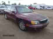 2003 Hyundai XG with VIN KMHFU45E33A252846, listed as a IAAI auction lot 42897334 with 94,636 mi miles and . Bid and sale history available at DreamBid. Image 1.