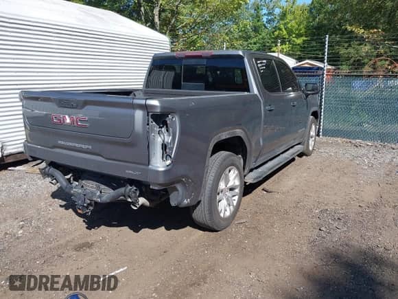 2020 GMC Sierra 1500 SLT with VIN 3GTU9DETXLG289809, listed as a IAAI auction lot 43137277 with 88,287 mi miles and . Bid and sale history available at DreamBid. Image 4.