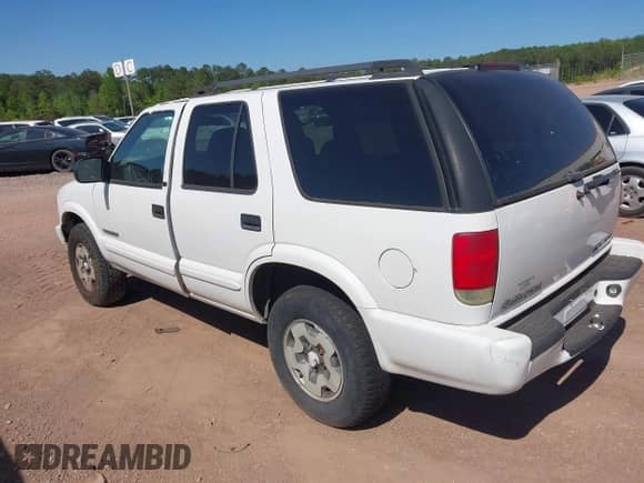 2003 Chevrolet Blazer LS с VIN 1GNDT13X53K152850, выставлен на аукционе IAAI как лот 41982795 с пробегом 261 155 миль миль и . История ставок и продаж доступна на DreamBid. Изображение 3.
