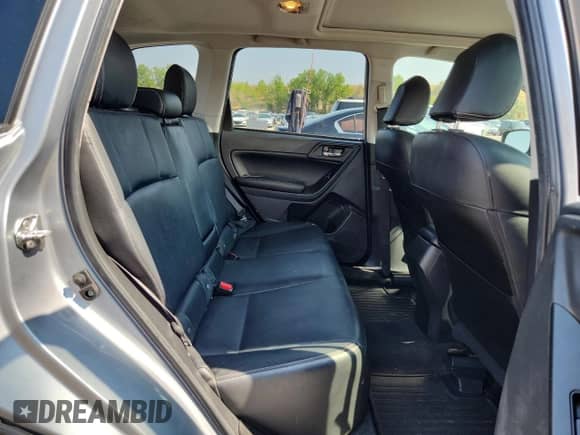 2014 Subaru Forester Limited z VIN JF2SJAHCXEH455054, wystawiony jako Copart lot #71115285 z przebiegiem 88 601 mil mil oraz Szkoda całkowita • Salvage title. Historia ofert i sprzedaży dostępna na DreamBid. Obrazek 11.