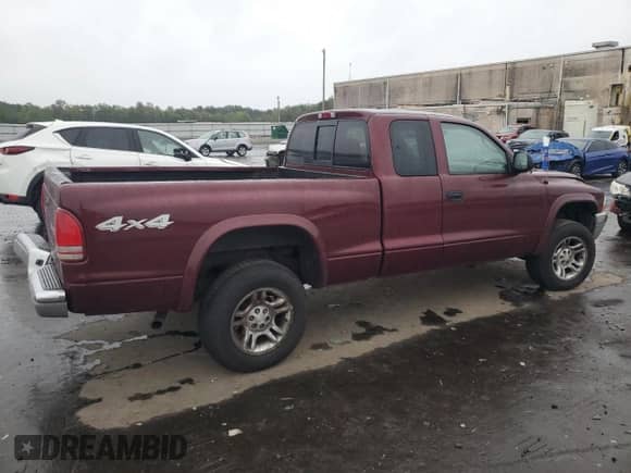 2003 Dodge Dakota SLT z VIN 1D7HG42N03S317953, wystawiony jako Copart lot #72736414 z przebiegiem 280 504 mil mil oraz Szkoda całkowita • Salvage title. Historia ofert i sprzedaży dostępna na DreamBid. Obrazek 3.