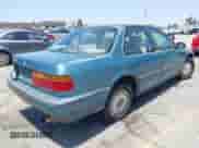 1991 Honda Accord EX z VIN JHMCB7560MC063583, wystawiony jako IAAI lot #42563870 z przebiegiem 226 798 mil mil oraz . Historia ofert i sprzedaży dostępna na DreamBid. Obrazek 4.