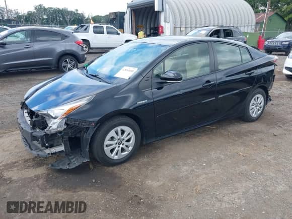 2016 Toyota Prius Two with VIN JTDKBRFU8G3013461, listed as a IAAI auction lot 42893690 with 108,926 mi miles and . Bid and sale history available at DreamBid. Image 18.