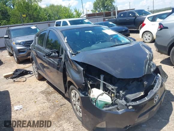 2014 Toyota Prius One z VIN JTDKDTB38E1574160, wystawiony jako IAAI lot #42890490 z przebiegiem 166 510 mil mil oraz . Historia ofert i sprzedaży dostępna na DreamBid. Obrazek 1.