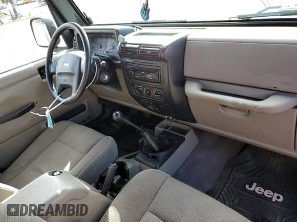 2005 Jeep Wrangler X с VIN 1J4FA39S75P332782, выставлен на аукционе Copart как лот 82334965 с пробегом 227 274 миль миль и Списание • Salvage title. История ставок и продаж доступна на DreamBid. Изображение 8.