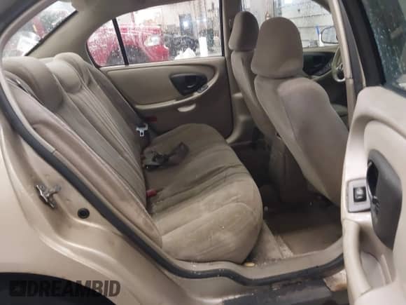 2005 Chevrolet Malibu Classic z VIN 1G1ND52F25M126197, wystawiony jako IAAI lot #41635127 z przebiegiem 218 168 mil mil oraz . Historia ofert i sprzedaży dostępna na DreamBid. Obrazek 8.