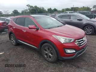 2014 Hyundai Santa Fe z VIN 5XYZUDLB7EG140595, wystawiony jako IAAI lot #42993619 z przebiegiem 157 389 mil mil oraz . Historia ofert i sprzedaży dostępna na DreamBid. Obrazek 1.
