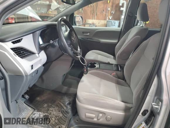 2016 Toyota Sienna LE with VIN 5TDJK3DC8GS133522, listed as a Copart auction lot 62090075 with 57,347 mi miles and Salvage title. Bid and sale history available at DreamBid. Image 7.