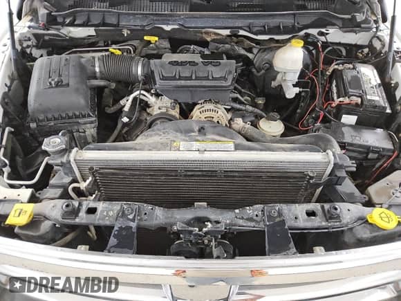 2012 Ram 1500 ST z VIN 1C6RD7FP3CS203036, wystawiony jako Copart lot #80511715 z przebiegiem 199 374 mil mil oraz Czysty tytuł • Clean title. Historia ofert i sprzedaży dostępna na DreamBid. Obrazek 11.