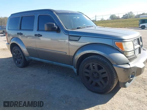 2011 Dodge Nitro Heat with VIN 1D4PU4GK0BW605964, listed as a IAAI auction lot 43522651 with 153,648 mi miles and . Bid and sale history available at DreamBid. Image 1.