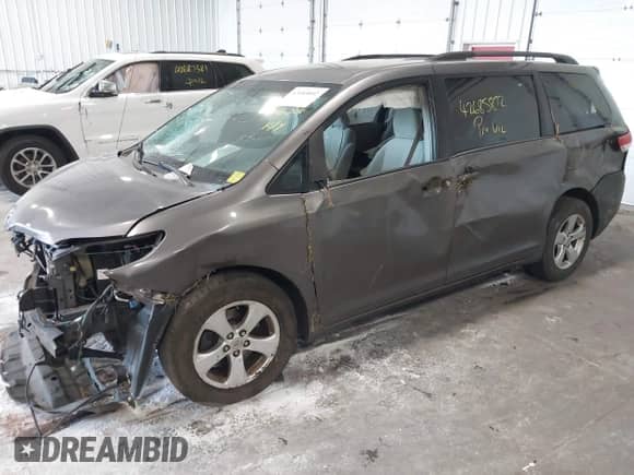2014 Toyota Sienna LE AAS with VIN 5TDKK3DC5ES416638, listed as a IAAI auction lot 42685892 with 202,889 mi miles and . Bid and sale history available at DreamBid. Image 17.