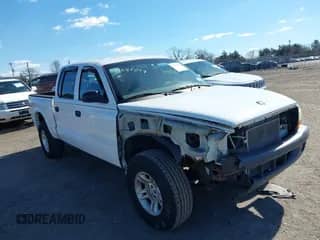 2004 Dodge Dakota Sport with VIN 1D7HG38N64S770557, listed as a IAAI auction lot 41694249 with 153,656 mi miles and . Bid and sale history available at DreamBid. Image 1.