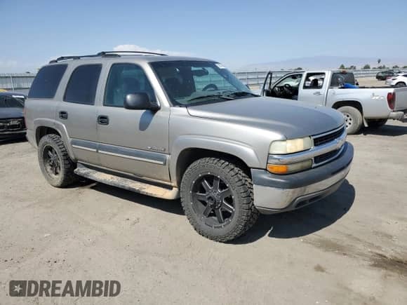2002 Chevrolet Tahoe LS с VIN 1GNEC13Z22R150369, выставлен на аукционе Copart как лот 59337465 с пробегом 204 513 миль миль и Списание • Salvage title. История ставок и продаж доступна на DreamBid. Изображение 4.