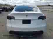 2023 Tesla Model Y Long Range with VIN 7SAYGAEE5PF592387, listed as a Copart auction lot 67555634 with 30,078 mi miles and Salvage title. Bid and sale history available at DreamBid. Image 6.
