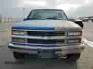 1997 Chevrolet Silverado 2500 z VIN 1GCGK29R0VE248443, wystawiony jako Copart lot #85760024 z przebiegiem 295 798 mil mil oraz Czysty tytuł • Clean title. Historia ofert i sprzedaży dostępna na DreamBid. Obrazek 5.