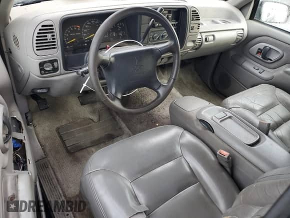 1996 Chevrolet Suburban с VIN 3GNEC16R9TG167845, выставлен на аукционе Copart как лот 80119734 с пробегом 414 794 миль миль и Списание • Salvage title. История ставок и продаж доступна на DreamBid. Изображение 8.