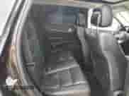 2013 Jeep Grand Cherokee Limited z VIN 1C4RJEBG4DC636503, wystawiony jako Copart lot #89665075 z przebiegiem 143 877 mil mil oraz Czysty tytuł • Clean title. Historia ofert i sprzedaży dostępna na DreamBid. Obrazek 10.