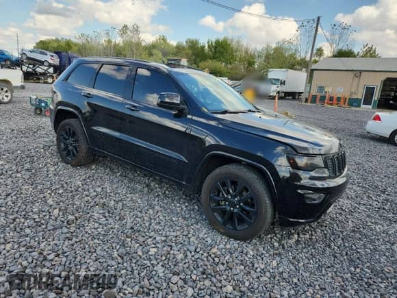 2018 Jeep Grand Cherokee Laredo with VIN 1C4RJFAG8JC244482, listed as a Copart auction lot 85572555 with 90,867 mi miles and Salvage title. Bid and sale history available at DreamBid. Image 4.