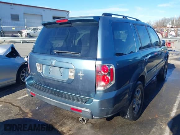 2006 Honda Pilot EX-L z VIN 5FNYF28566B052448, wystawiony jako IAAI lot #38364489 z przebiegiem 227 729 mil mil oraz . Historia ofert i sprzedaży dostępna na DreamBid. Obrazek 4.