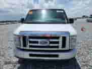2013 Ford Econoline Cargo Commercial with VIN 1FTNE2EW1DDA46709, listed as a Copart auction lot 64098505 with 194,401 mi miles and Salvage title. Bid and sale history available at DreamBid. Image 5.