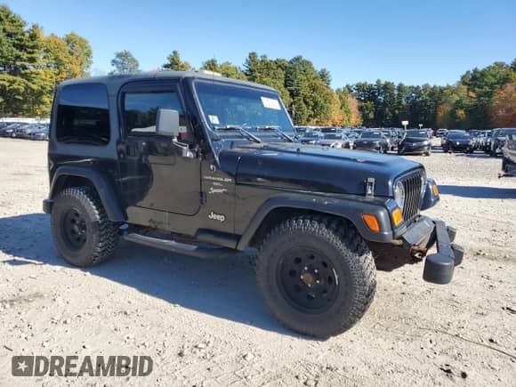 2000 Jeep Wrangler Sport with VIN 1J4FA49S1YP796600, listed as a Copart auction lot 82574545 with 128,340 mi miles and Clean title. Bid and sale history available at DreamBid. Image 4.