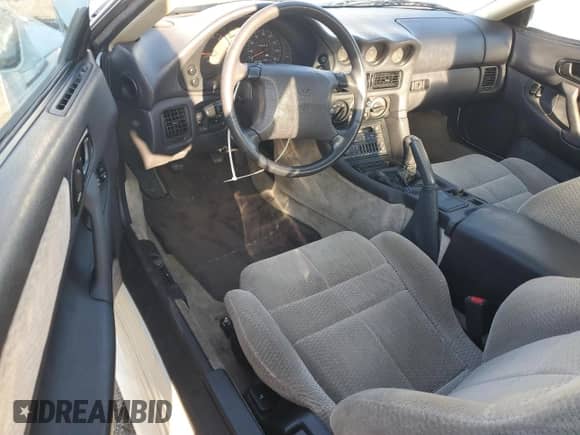 1994 Dodge Stealth with VIN JB3AM44H1RY006874, listed as a Copart auction lot 75991164 with 59,310 mi miles and Salvage title. Bid and sale history available at DreamBid. Image 8.