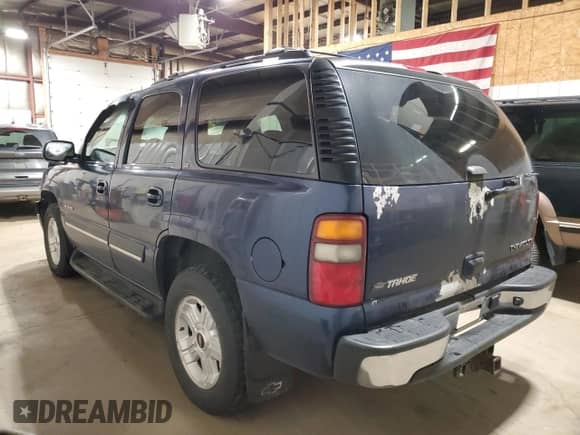 2003 Chevrolet Tahoe LT z VIN 1GNEK13Z33J204958, wystawiony jako Copart lot #86888695 z przebiegiem 136 986 mil mil oraz Szkoda całkowita • Salvage title. Historia ofert i sprzedaży dostępna na DreamBid. Obrazek 2.