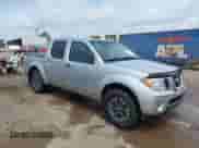 2016 Nissan Frontier S z VIN 1N6AD0EV8GN774648, wystawiony jako IAAI lot #42135409 z przebiegiem 94 095 mil mil oraz . Historia ofert i sprzedaży dostępna na DreamBid. Obrazek 1.