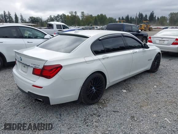 2013 BMW 7 Series 740Li with VIN WBAYE4C57DD136902, listed as a IAAI auction lot 43210485 with 70,724 mi miles and . Bid and sale history available at DreamBid. Image 4.