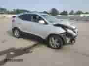 2012 Hyundai Tucson GLS z VIN KM8JU3AC6CU460095, wystawiony jako Copart lot #71960445 z przebiegiem 124 146 mil mil oraz Szkoda całkowita • Salvage title. Historia ofert i sprzedaży dostępna na DreamBid. Obrazek 4.