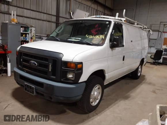 2014 Ford Econoline Cargo Commercial with VIN 1FTNE2EL6EDB13764, listed as a IAAI auction lot 42647684 with 99,876 mi miles and . Bid and sale history available at DreamBid. Image 17.