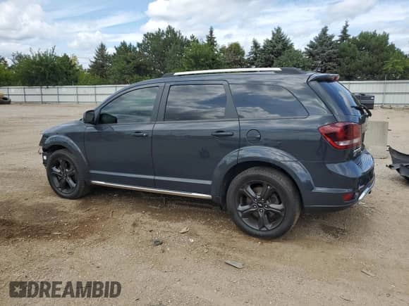 2018 Dodge Journey Crossroad with VIN 3C4PDDGG7JT387471, listed as a Copart auction lot 70184715 with 94,787 mi miles and Salvage title. Bid and sale history available at DreamBid. Image 2.