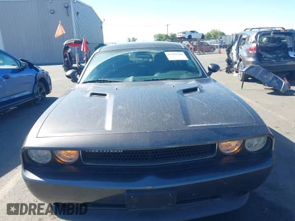 2013 Dodge Challenger SXT with VIN 2C3CDYAGXDH675016, listed as a IAAI auction lot 43325216 with 129,120 mi miles and . Bid and sale history available at DreamBid. Image 12.